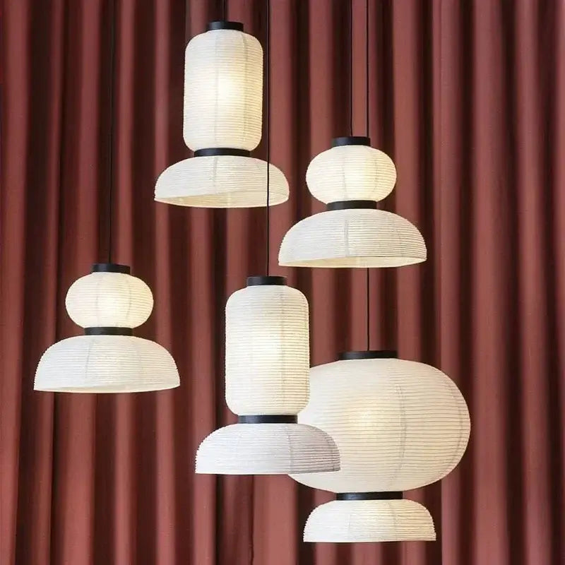 Elegant white paper lantern pendant light with black metal accents by DecorBites for living room and restaurant use