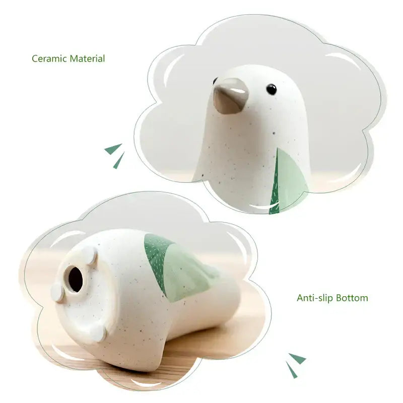 White ceramic DecorBites bird figurines with speckled texture and green leaf accents for elegant home decor