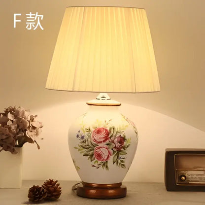 DecorBites™ bird flower ceramic table lamp in white with pink roses and cream pleated shade for bedroom use