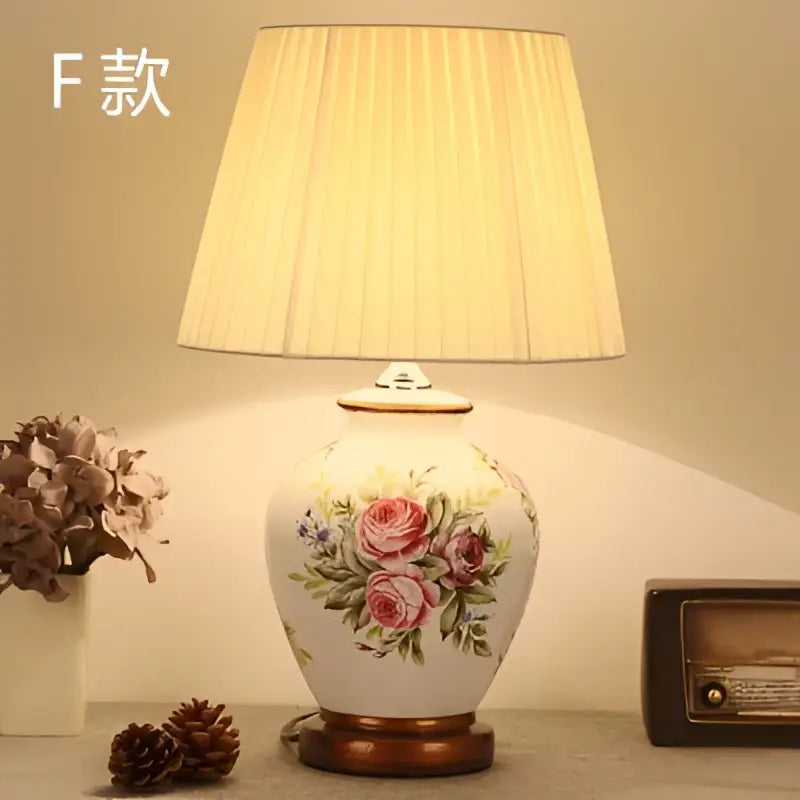 DecorBites™ bird flower ceramic table lamp in white with pink roses and cream pleated shade for bedroom use