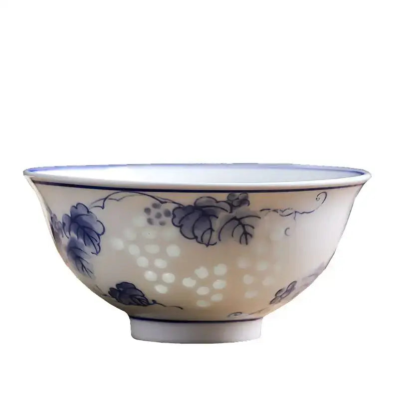 A delicate decorbites™ set of 2 white porcelain vegetable plates and rice soup bowls with blue grapevine motifs