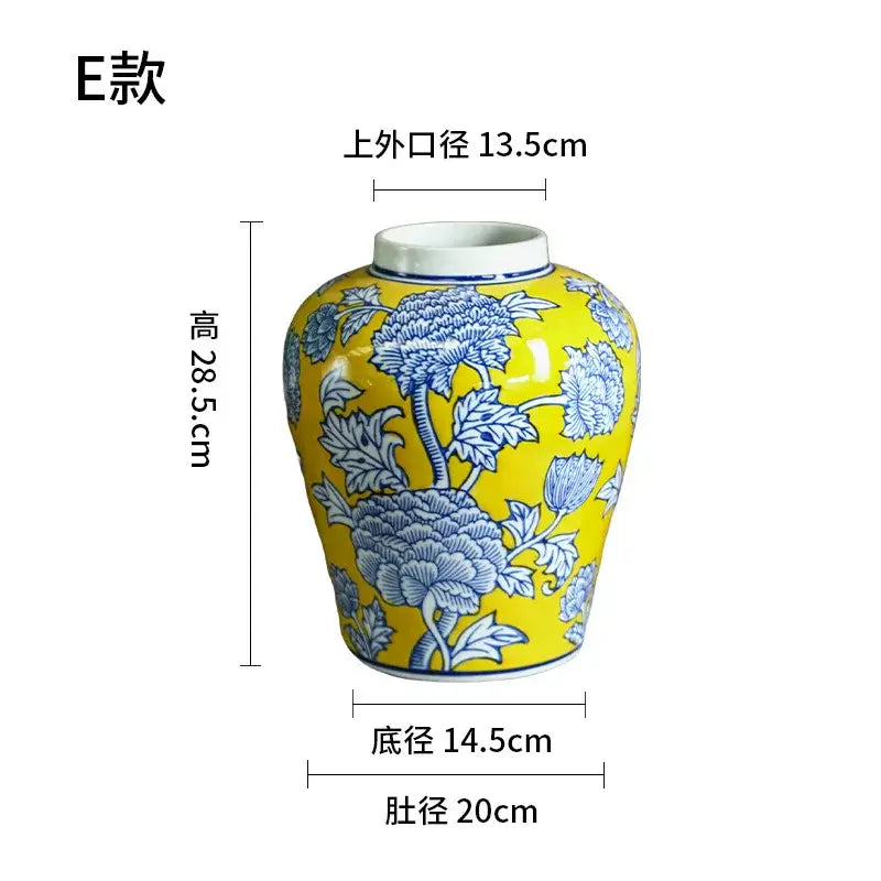 A vibrant yellow DecorBites Chinese blue white porcelain vase with intricate blue floral patterns and a white rim