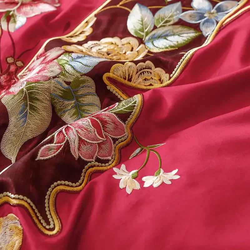 Rich crimson silk bedding set with intricate gold pink and green floral embroidery from decorbites chinese butterfly flowers collection