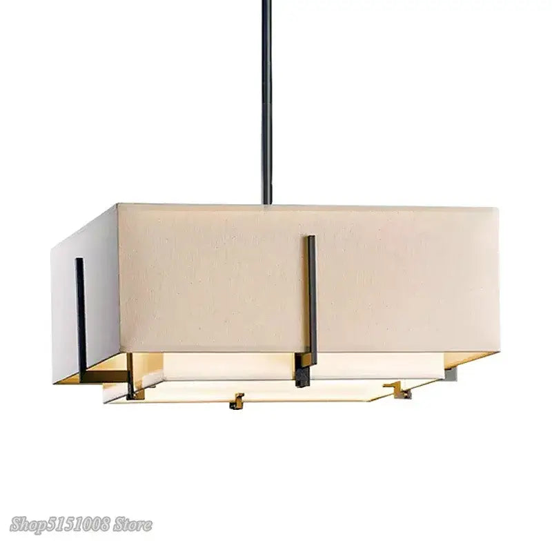 Modern minimalist living pendant lamp with beige fabric shade and black-gold metal frame for minimalist living room