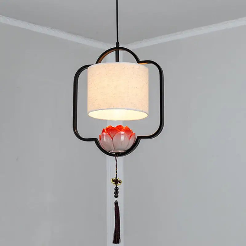 Decorbites cloth chandelier with black metal frame cream fabric shade and orange lotus accent for dining room lighting