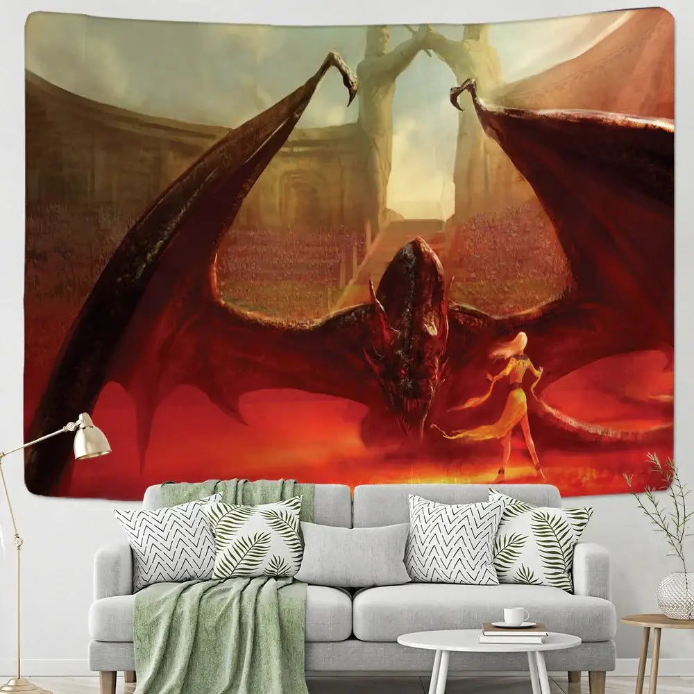 A vibrant red dragon castle totem tapestry with detailed wings hanging above a gray sofa by DecorBites