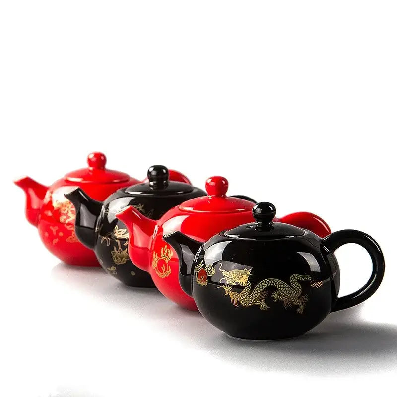 Black ceramic tea pot set with gold dragon design and red accents from decorbites™ ceramic red tea collection