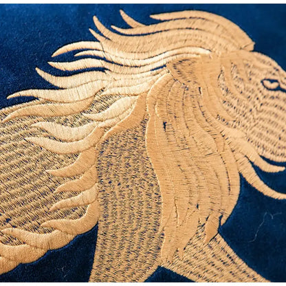 Golden embroidered lion head on deep blue velvet dragon embroidery lumbar pillow cover by decorbites