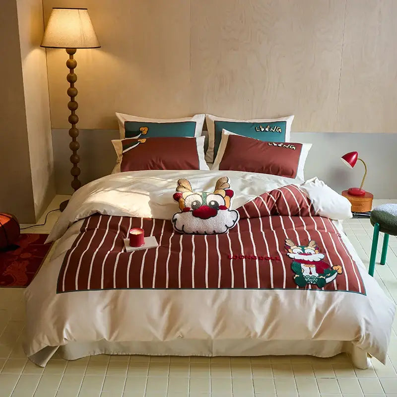 Red and white striped king size embroidered cotton bedding set with cartoon reindeer design by decorbites