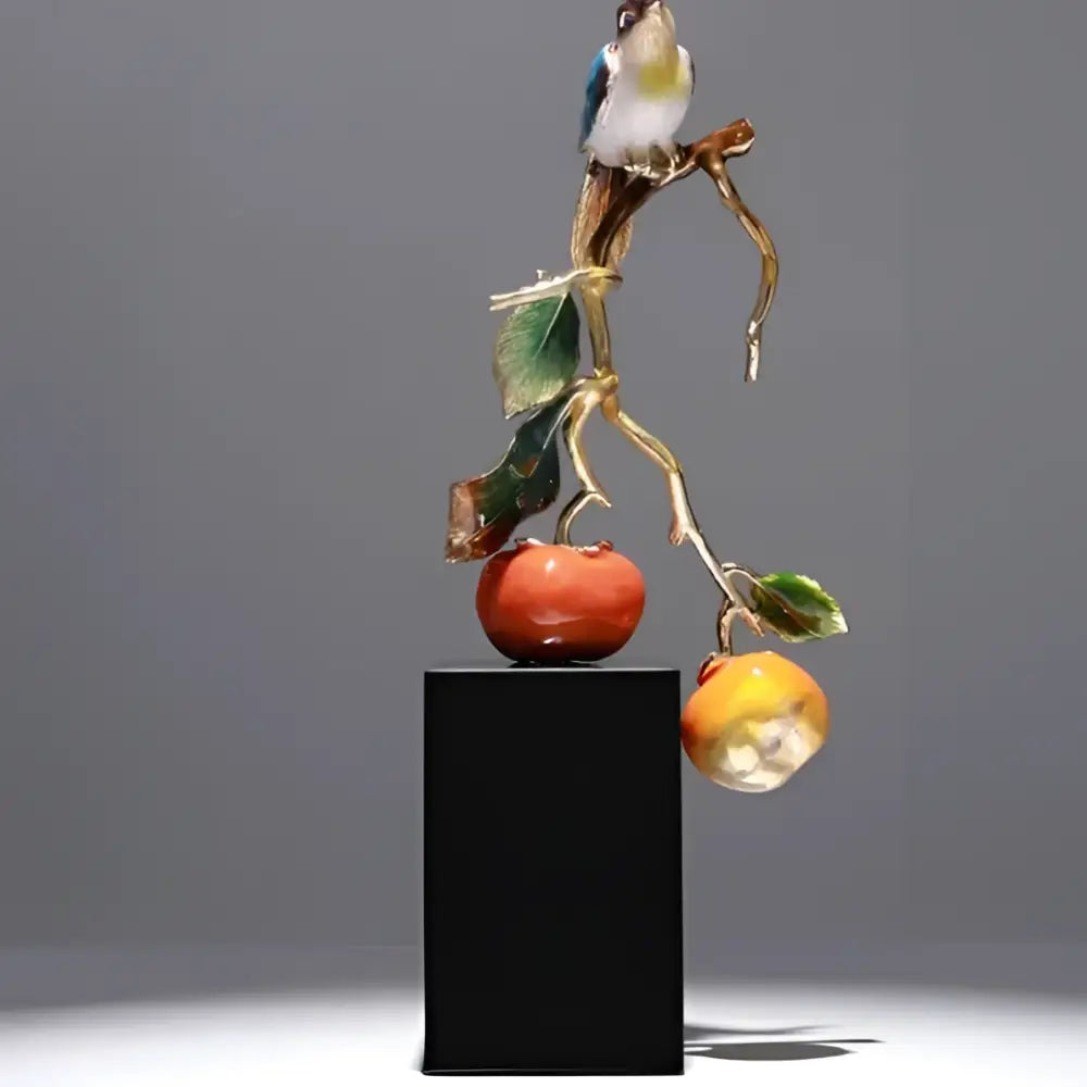 Decorbites™ enamel persimmon ruyi ornament featuring a handcrafted bird on a golden branch with red and yellow fruit details