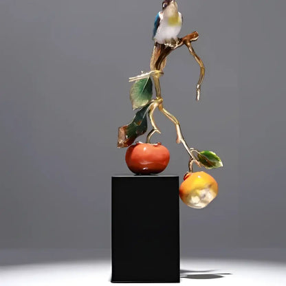 Decorbites™ enamel persimmon ruyi ornament featuring a handcrafted bird on a golden branch with red and yellow fruit details