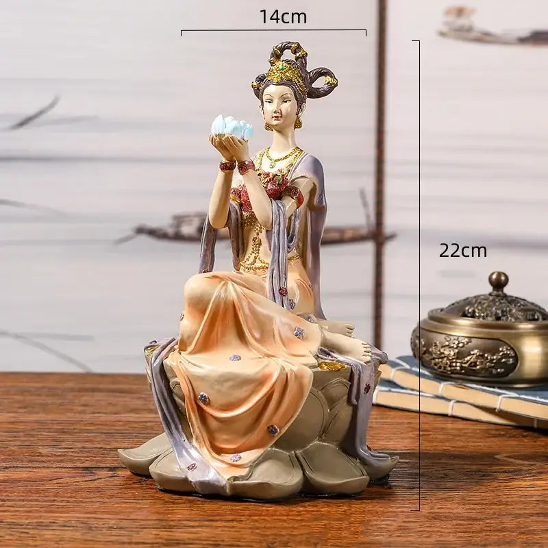 DecorBites™ resin chinese goddess fairy figurine in flowing robes with gold accents and blue lotus for home decor