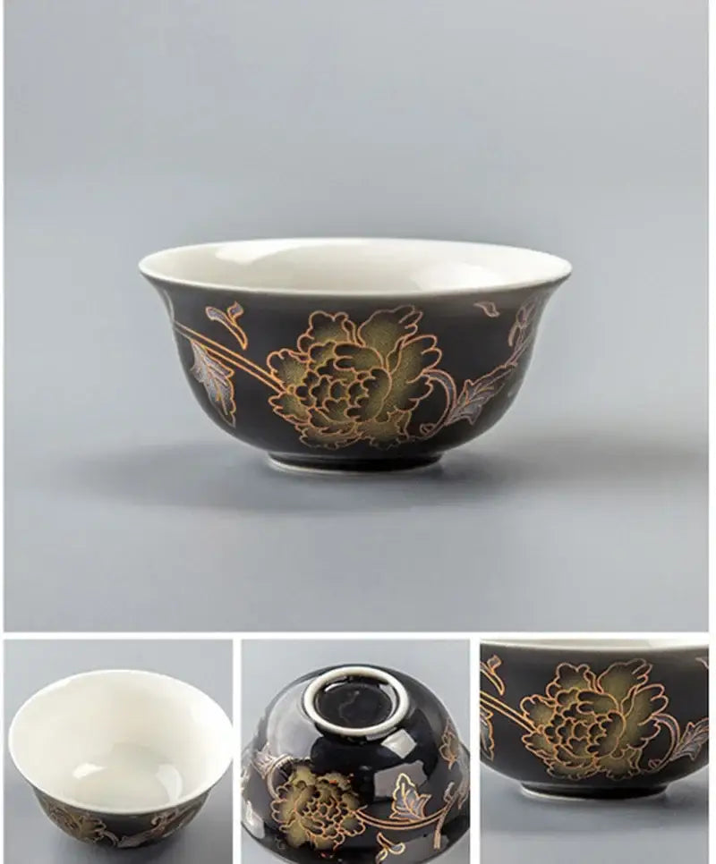 Black ceramic tea cup with gold-painted peony design and white interior from DecorBites dragon tea cup set