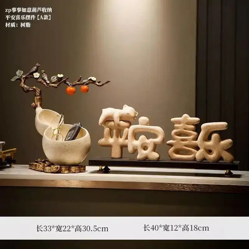 Beige ceramic decorbites™ chinese gourd desktop storage decoration with tree branch, birds, oranges, and sculpted chinese characters on dark base