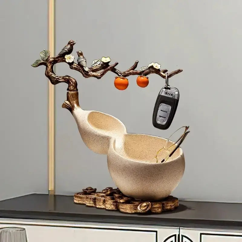 Beige ceramic Chinese gourd desktop storage decoration with sculpted branch top featuring birds blossoms and oranges