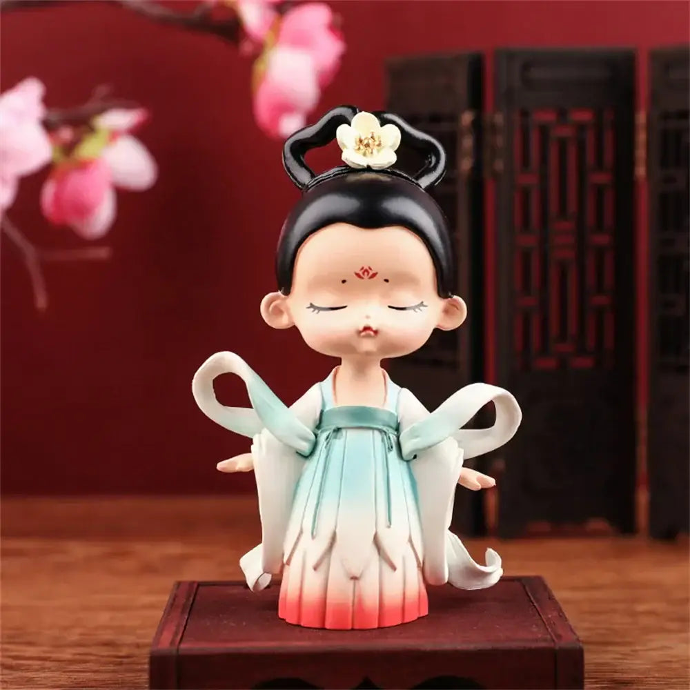 DecorBites™ hanfu court princess resin statue featuring black hair with white flower in gradient dress for bookshelf decor