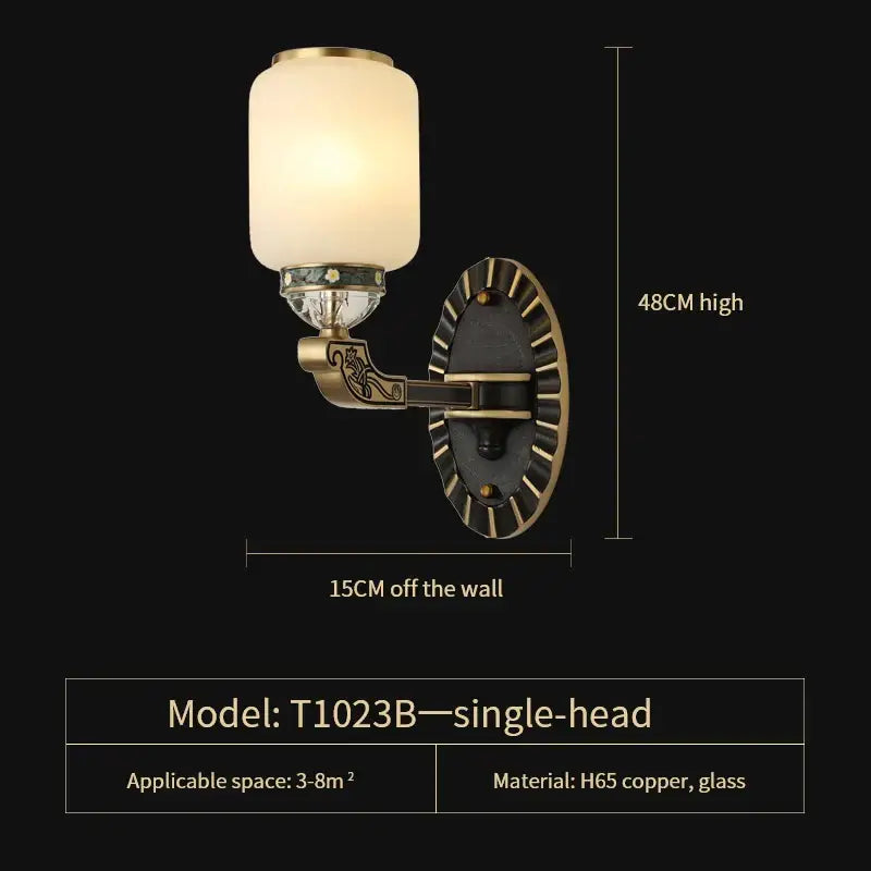 Antique brass-finished wall sconce with frosted glass and ornate copper detailing for decorbites jade chandelier lighting
