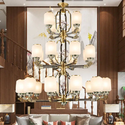A multi-tiered decorbites jade chandelier with brass-finished metalwork and frosted glass shades for modern duplex villa lighting