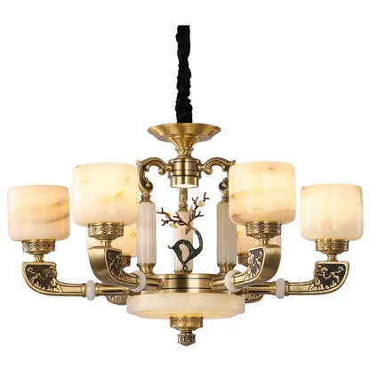 Brass DecorBites jade chandelier with five warm-toned marbled glass shades and ornate details for modern decor