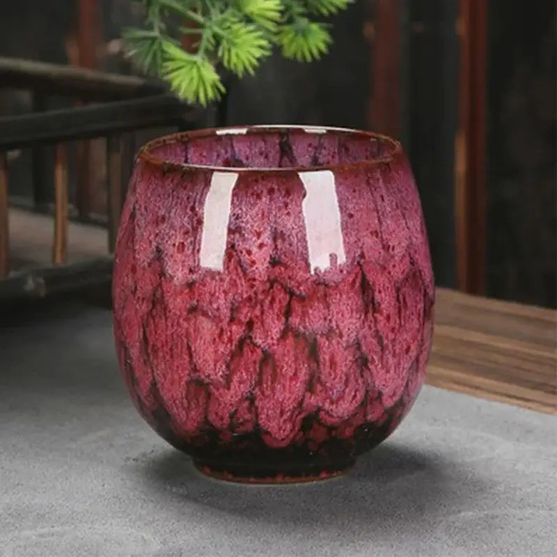 A handcrafted ceramic coffee cup with vibrant magenta and burgundy glaze from decorbites™ coffee cup set
