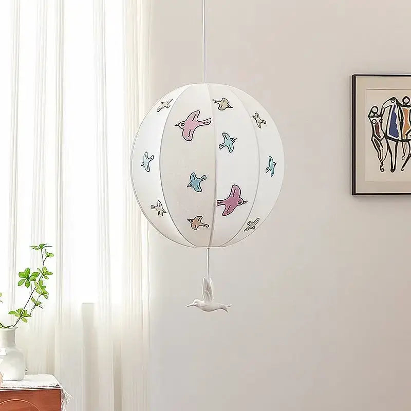 White spherical pendant light with pastel bird illustrations and ceramic bird ornament decorbites chinese medieval dove design