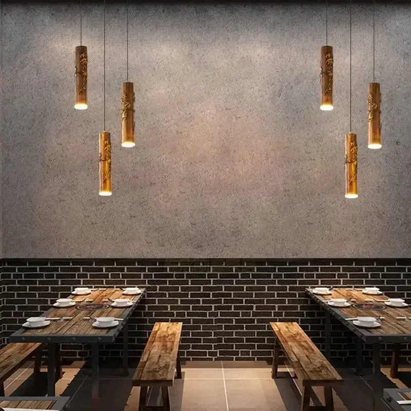 Golden bamboo-style decorbites chinese modern art pendant light with intricate carvings for hotpot restaurant bar use