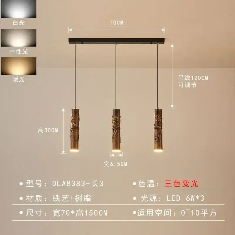Three dark brown cylindrical bamboo-style decorbites chinese modern pendant lights with carved patterns and led lighting