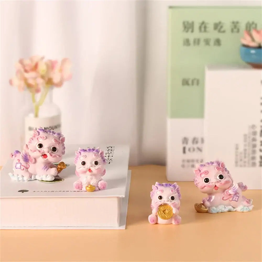 Decorbites™ pink and purple resin mythology lion figurines holding gold coins for luck wealth and protection