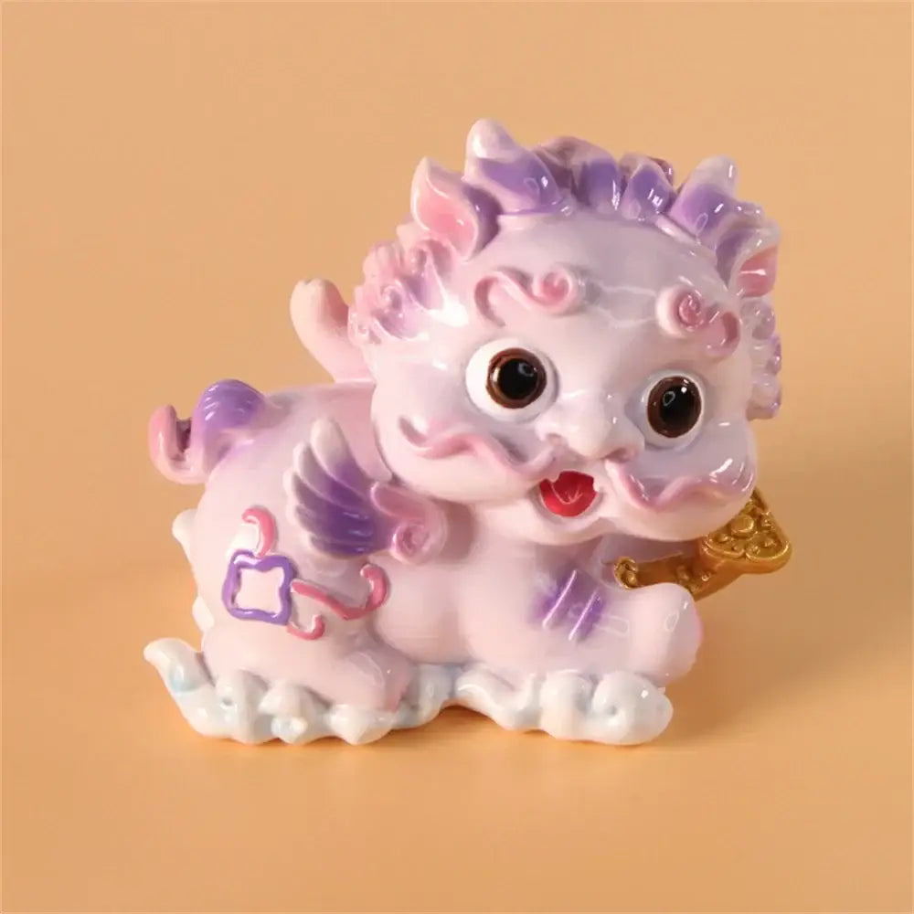 A charming pastel pink and purple glossy ceramic mythology lion figurine by decorbites for luck wealth and protection
