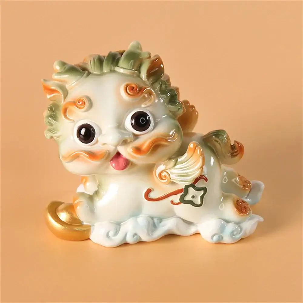 Cute white ceramic mythology lion figurines with green orange accents gold paw and decorative star emblem by decorbites