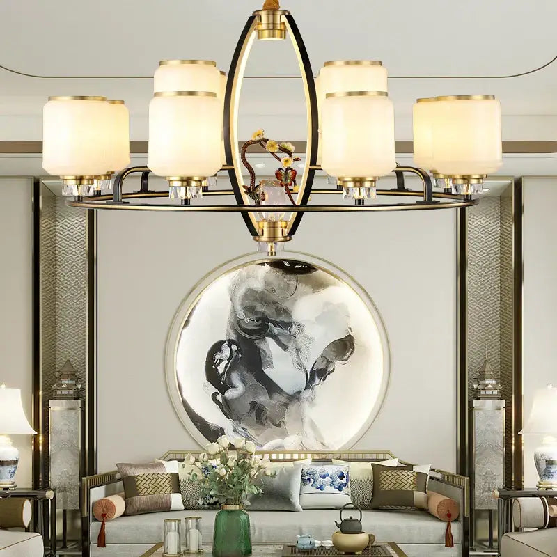 Gold-toned copper chandelier with six frosted glass shades and central decorative element for luxury living room by decorbites natural jade
