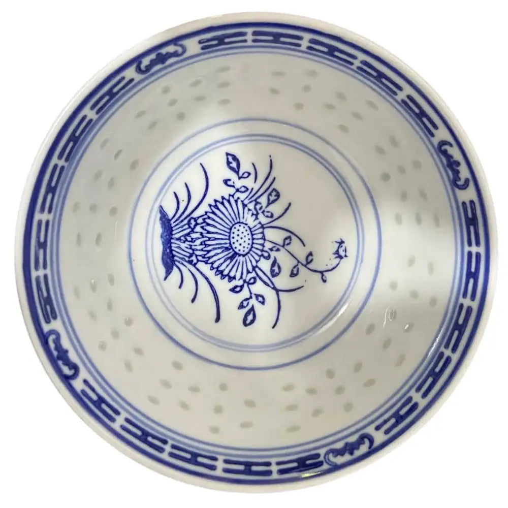 White ceramic decorbites chinese orchid dragon bowl with blue floral patterns and perforated interior for dessert use