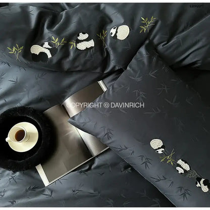 Dark gray satin decorbites™ duvet cover set with embroidered black and white pandas and bamboo jacquard design