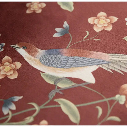 Embroidered bird with brown head on vines against red fabric on decorbites chinese peony flower pillow cover