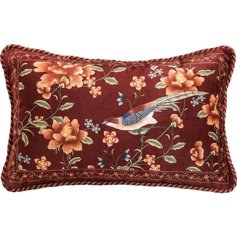 A rectangular burgundy velvet pillow cover with embroidered chinese peony flower and bird design by decorbites