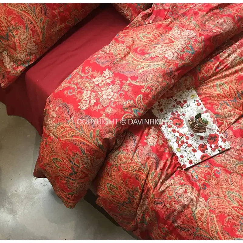 Red paisley-patterned duvet set in satin cotton with intricate floral designs for luxury satin cotton wedding bedding