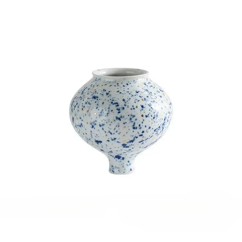 DecorBites™ retro ceramic vase with rounded body, white ceramic, and blue gold speckles for handmade home decor