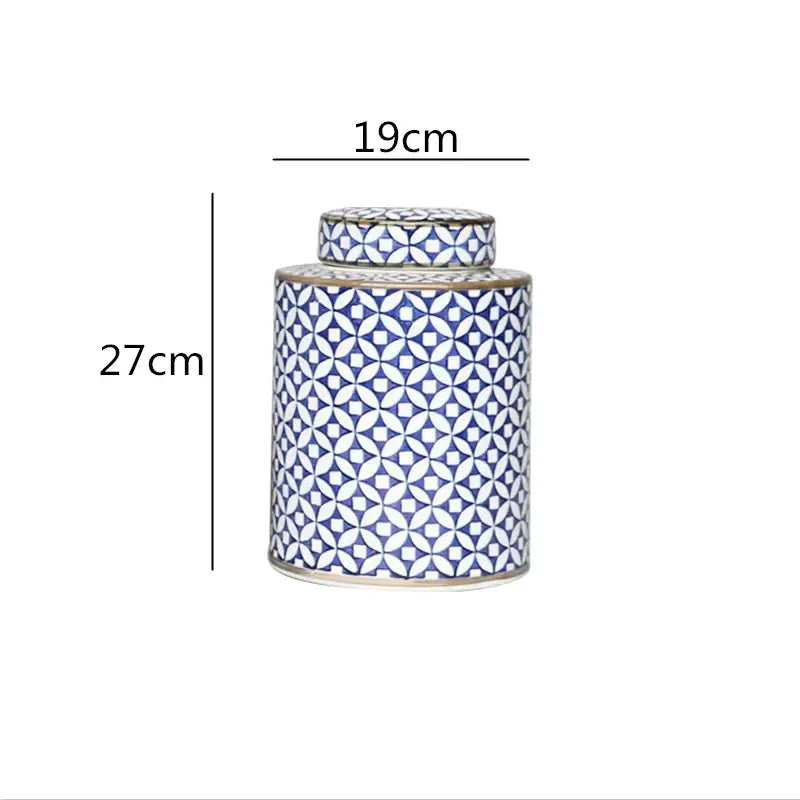 A tall porcelain tea canister with lid featuring blue and white geometric decorbites chinese retro ceramics design