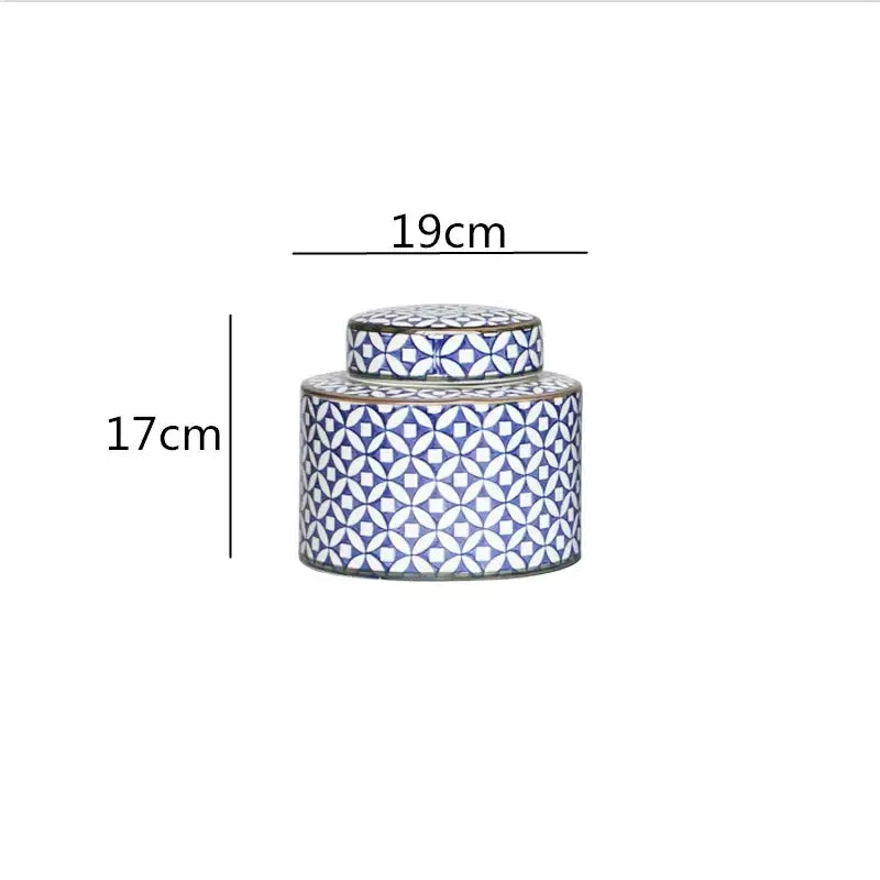 A cylindrical ceramic jar with a lid in blue and white geometric decorbites chinese retro ceramics golden design for home décor