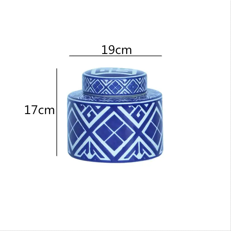 A blue ceramic tea caddy with white geometric patterns and lid from decorbites chinese retro ceramics collection