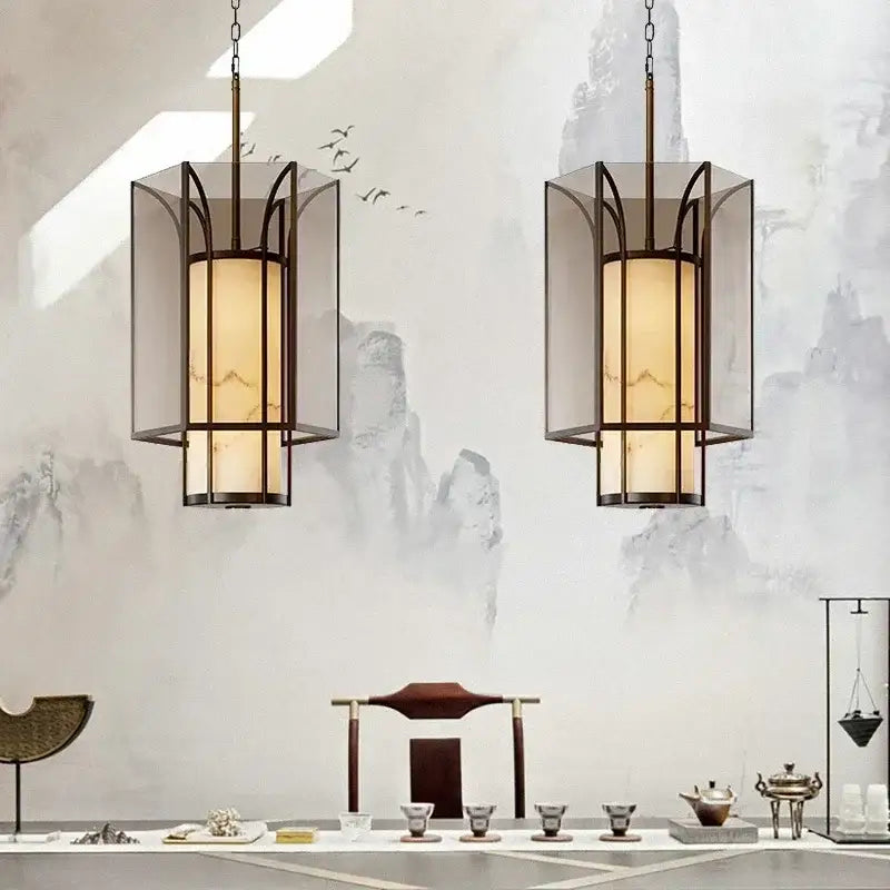 Two elegant black-framed lanterns with amber glass panels hang symmetrically in decorbites chinese retro chandelier