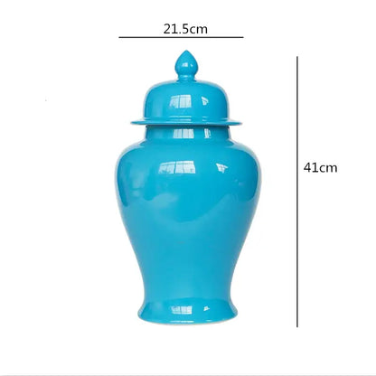 Vibrant turquoise ceramic general jar vase with matching lid and decorative finial for home decor and storage