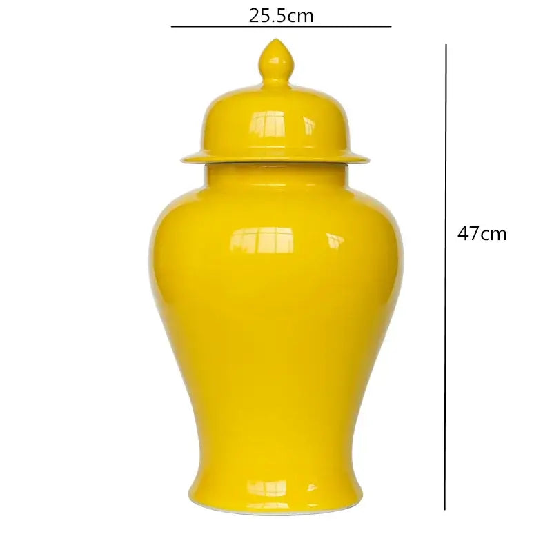 Bright yellow ceramic general jar vase with matching lid and tapered base for home decor and storage by decorbites