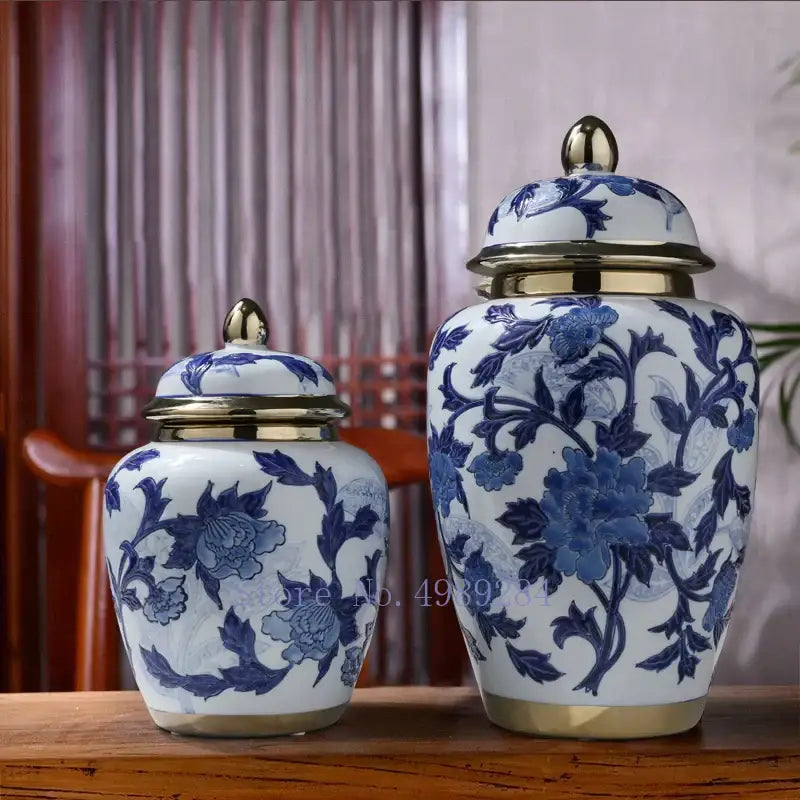 DecorBites™ blue and white porcelain storage tank vase with gold-toned lids and floral patterns for modern decor