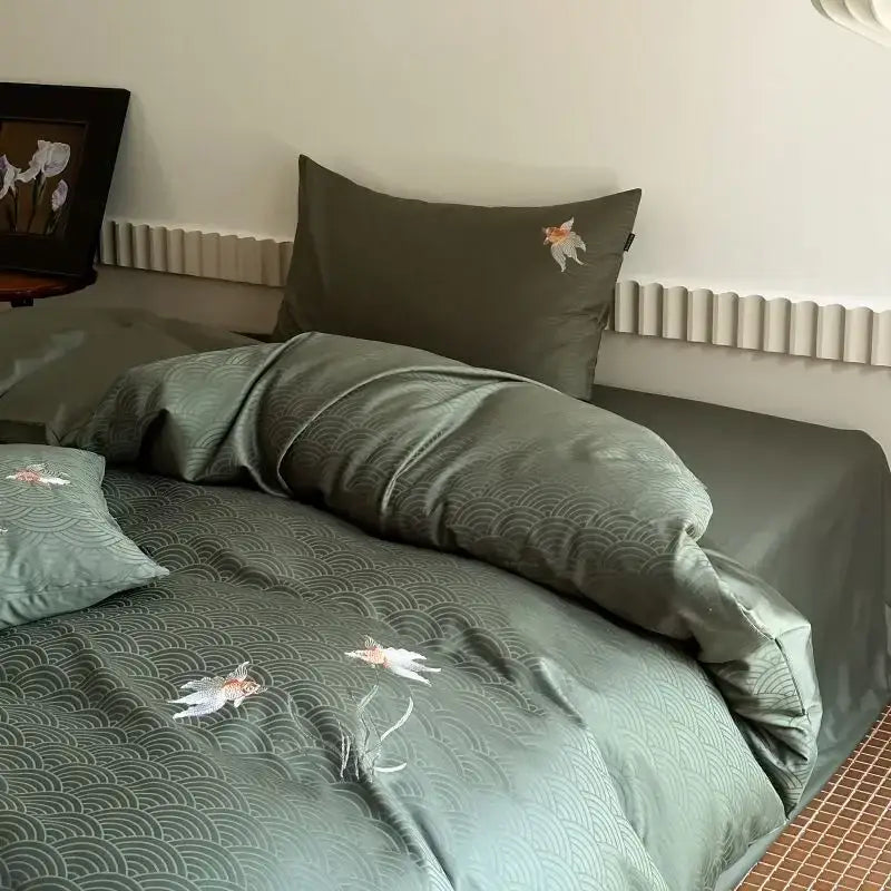 Olive green satin duvet cover set with delicate goldfish embroidery and subtle wave patterns by decorbites cotton jacquard