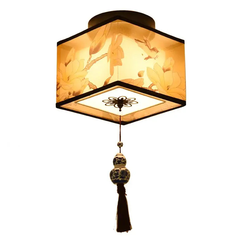 DecorBites Chinese style ceiling lamp with warm amber fabric shade and black metal filigree for hotel villa corridors