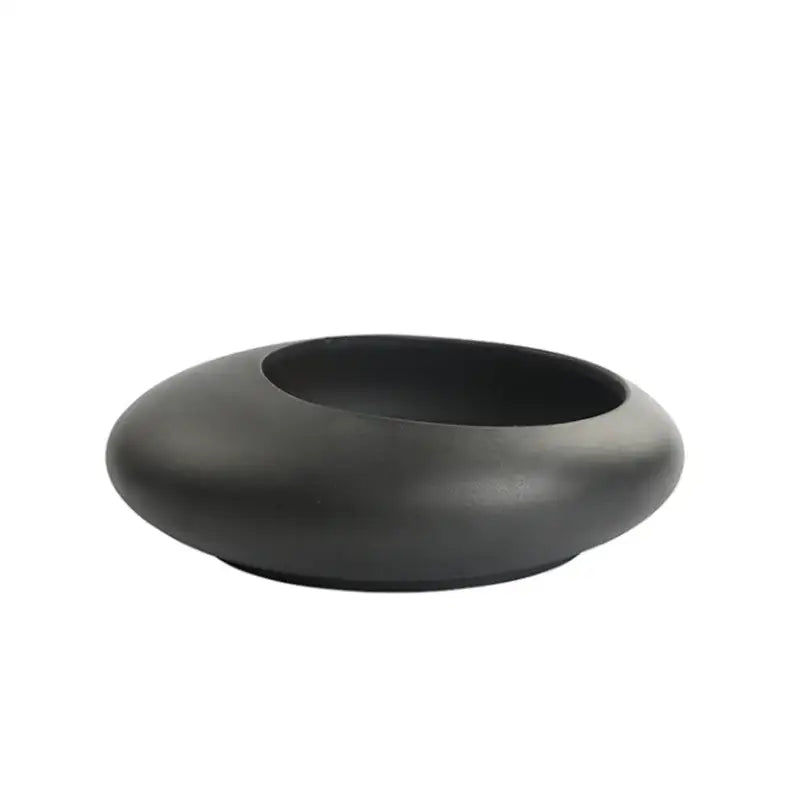 Black matte ceramic flowerpot vase with smooth rounded oval shape for bonsai floral decor and home arrangement