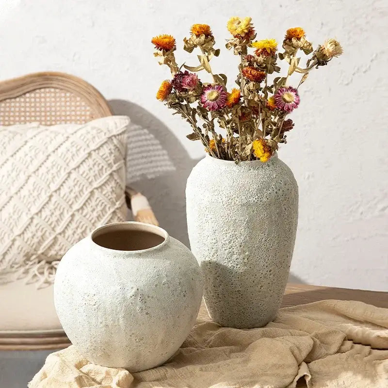 DecorBites™ chinese style ceramic vase in light gray with speckled finish holding dried orange and purple flowers