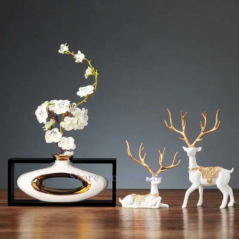 Decorbites chinese style ceramic vase in wooden frame featuring a white ceramic vase with gold accents holding white blossoms