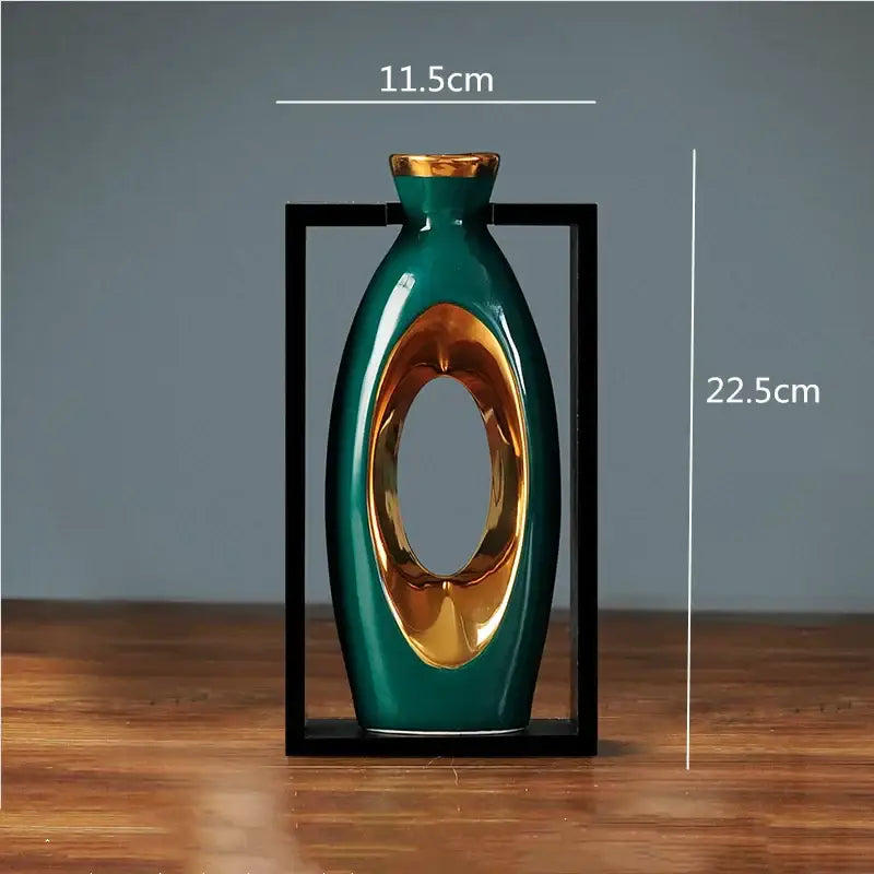 A sleek glossy teal ceramic vase with gold oval cutout and rim from decorbites chinese style collection for home decor